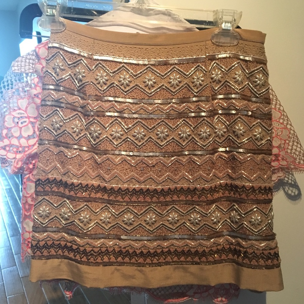Hand beaded, mini skirt fits like size 2. Tag size 42. European designer